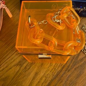 Orange purse with chain